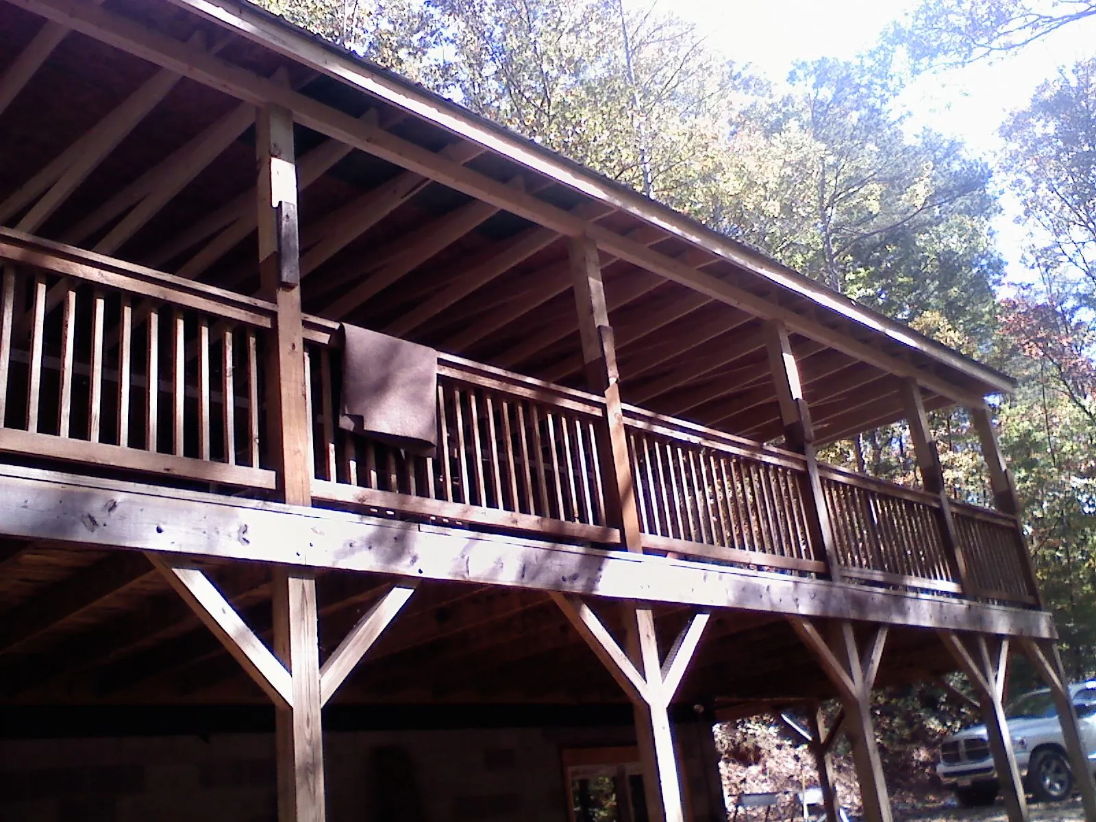 Timber framing under a new elevated porch and deck — Roof Leak Repair in Winfield by Roofing Brothers
